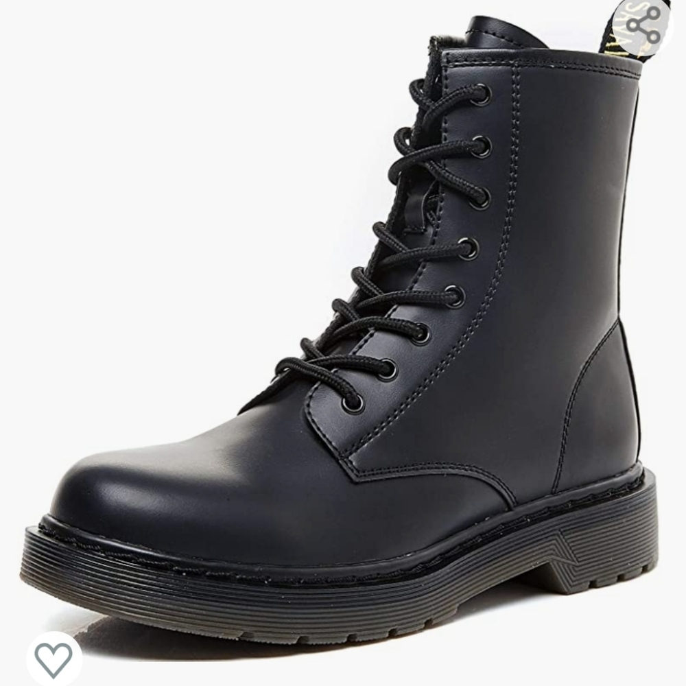 Classic combat boot with chunky lug sole and branded heel pull tab